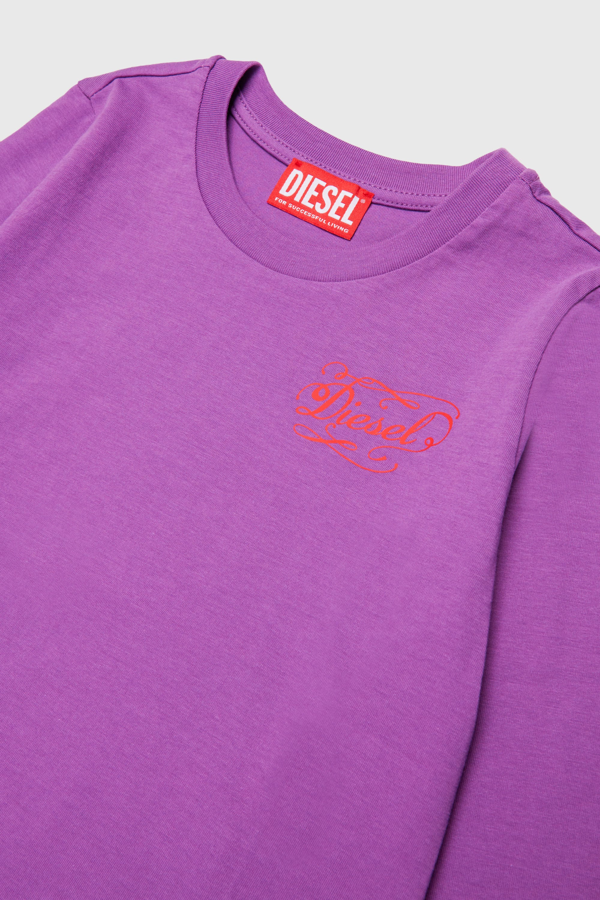 Diesel - TORSY, Woman's Long-sleeve T-shirt with whimsical logo print in Violet - 3
