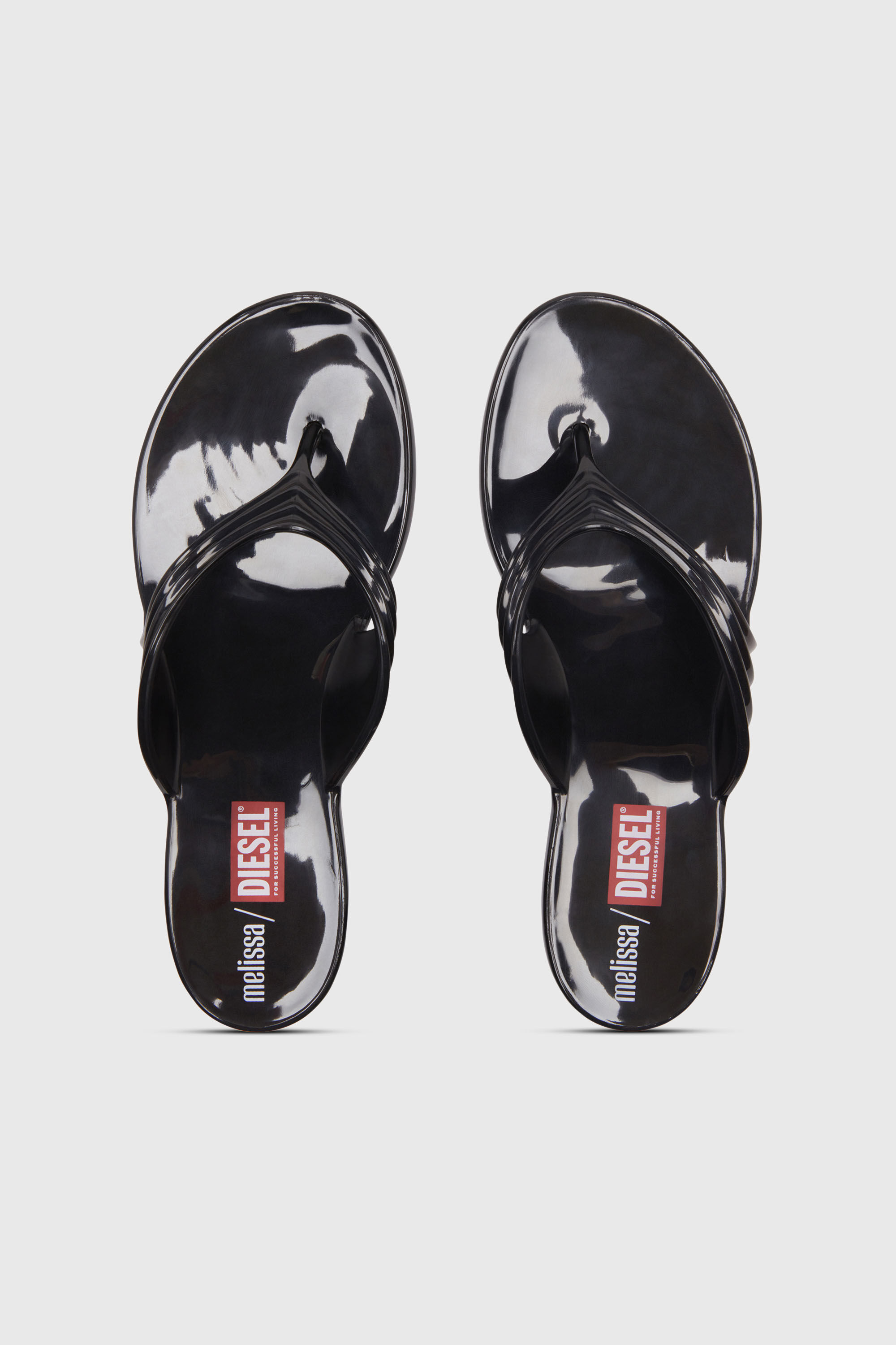 Women's Sculptural flip-flops in Melflex® | Black | Diesel {{Country}}