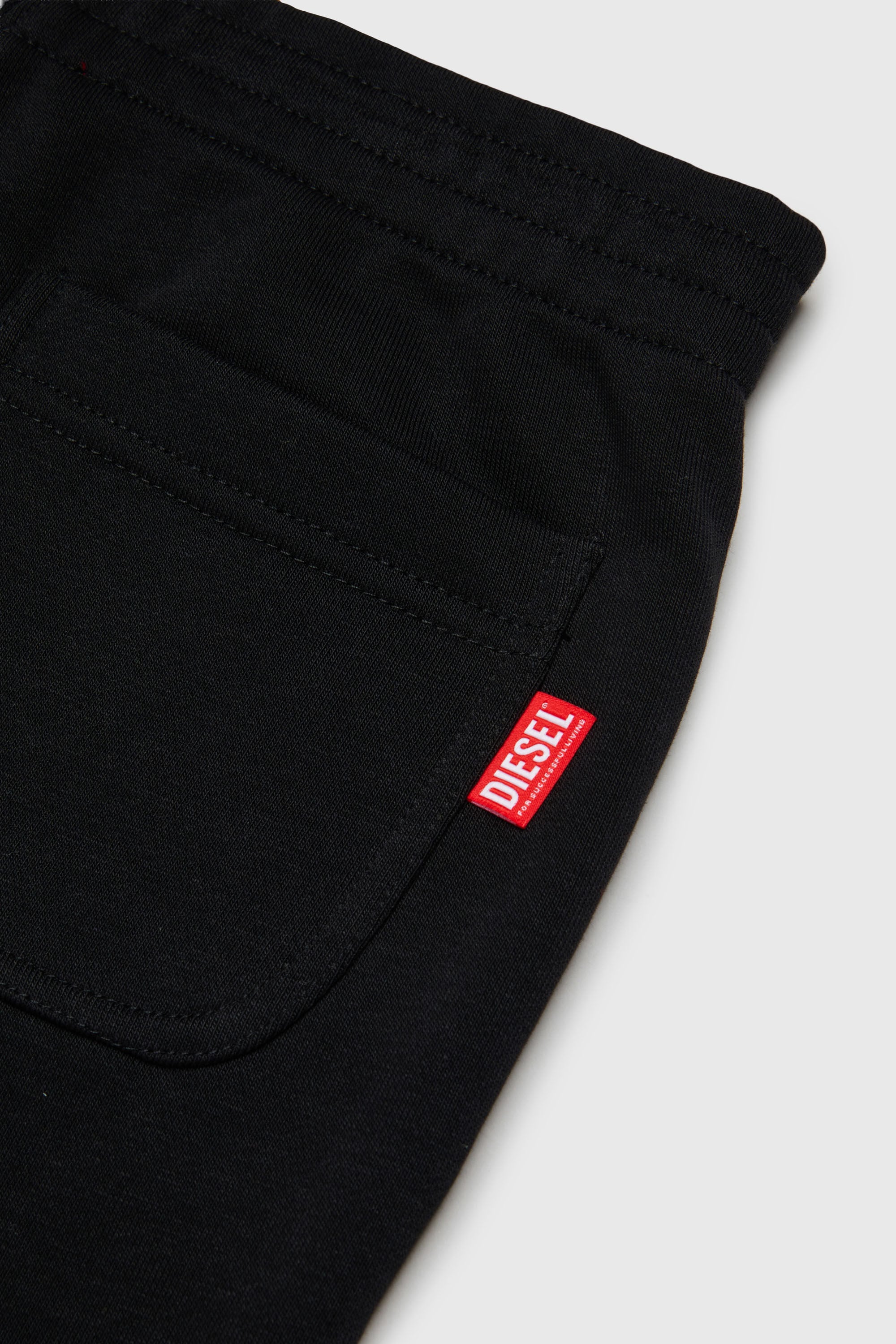 Diesel - PRES, Man's Sweatpants with cut-off logo print in Black - 4