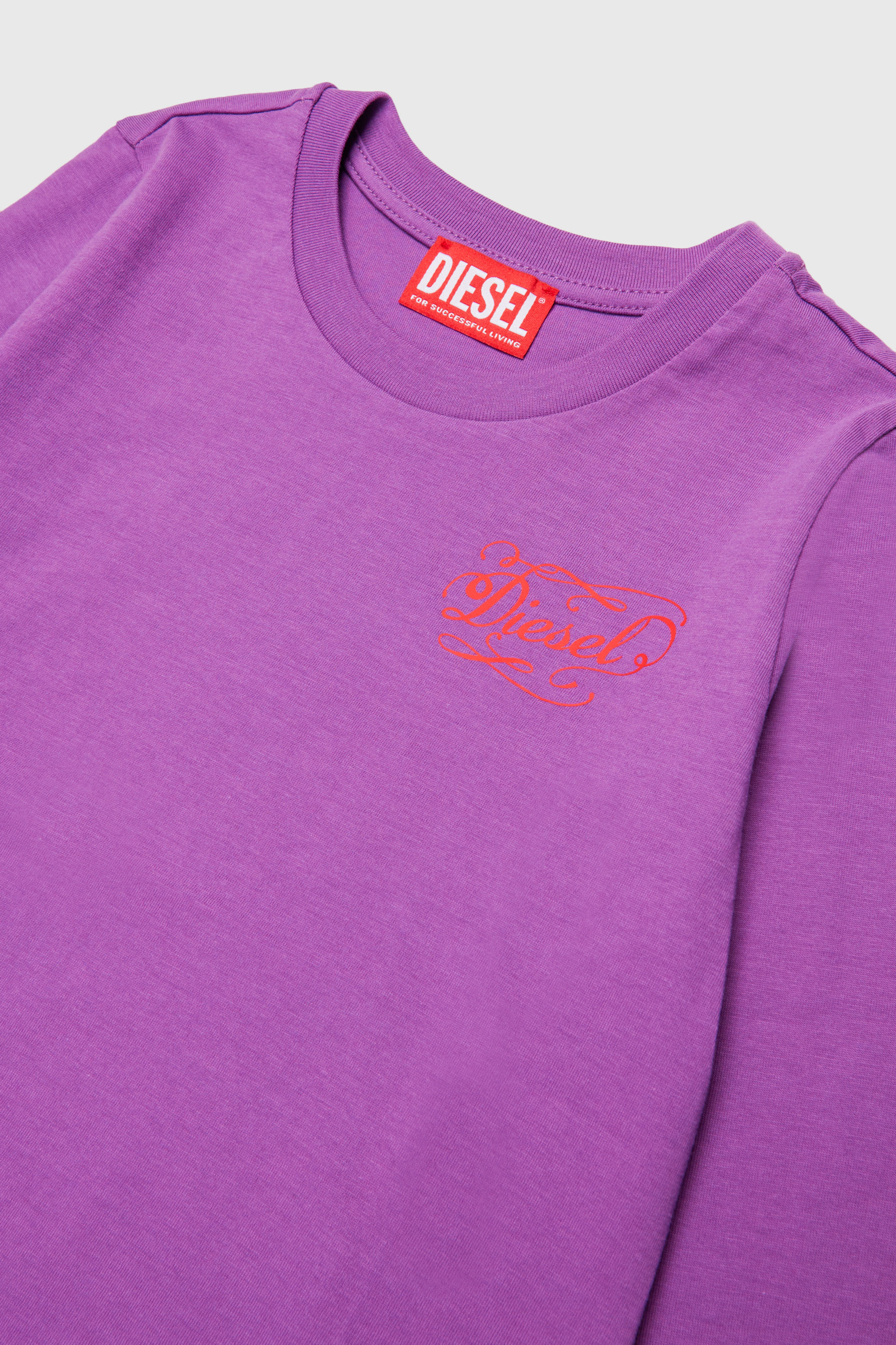 Diesel - TORSY, Woman's Long-sleeve T-shirt with whimsical logo print in Violet - 3