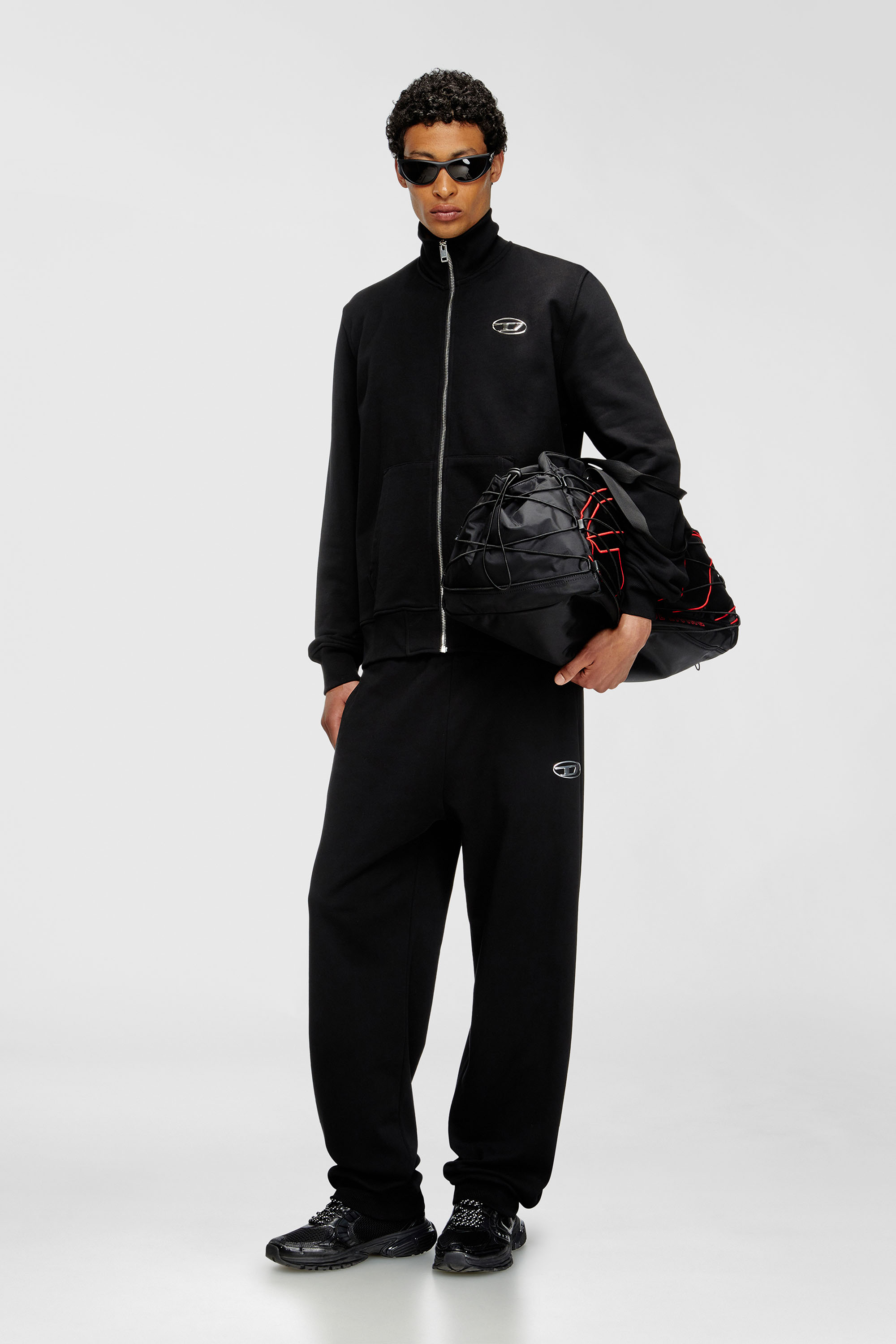 Pants with metal-effect Oval D logo